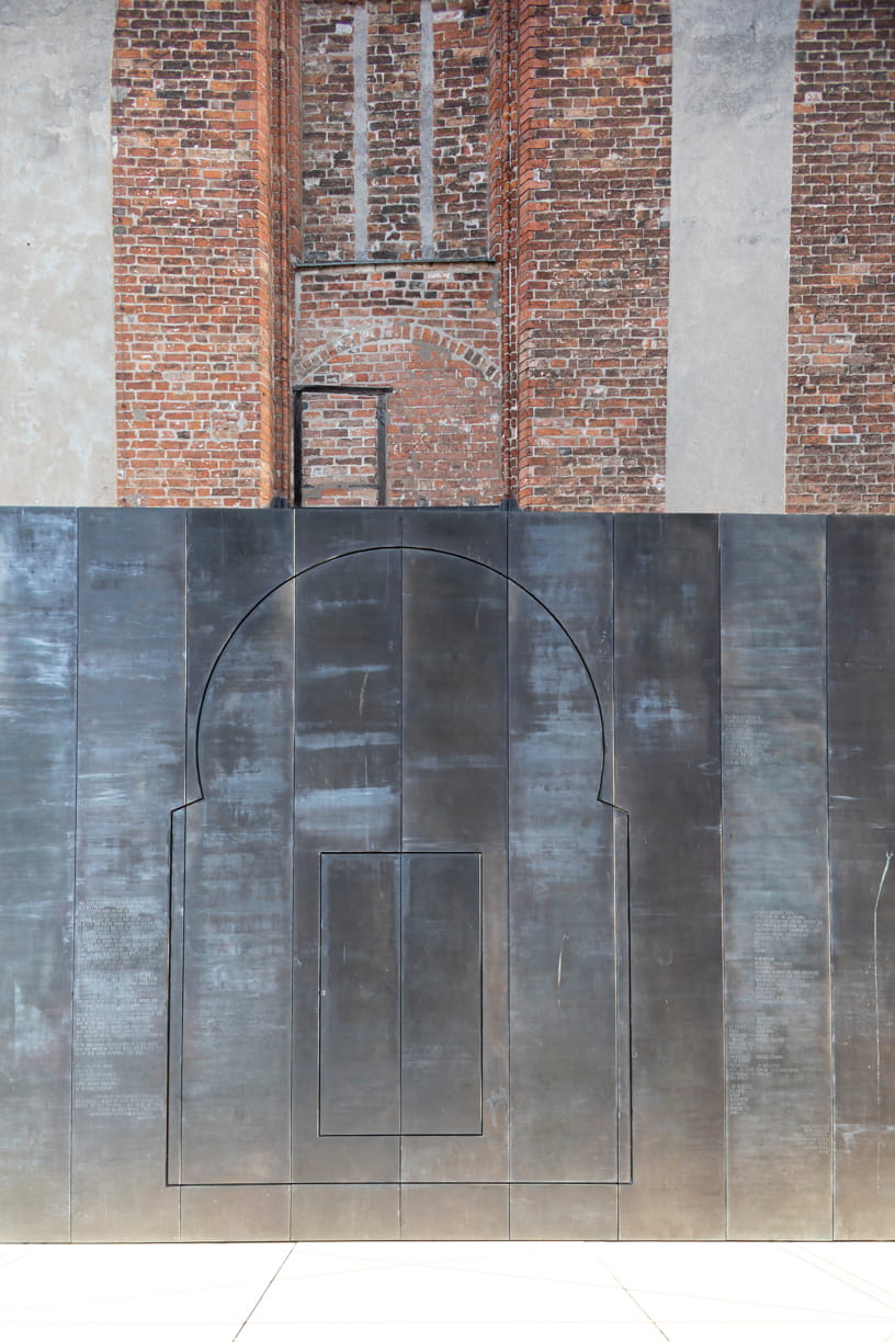 Detail of the red brick and iron façade of the European Hansemuseum by Andreas Heller Architects in Lübeck.