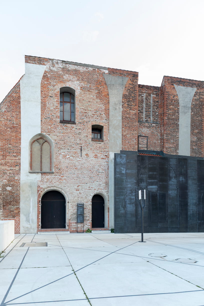 Red brick and iron façade of the European Hansemuseum by Andreas Heller Architects in Lübeck.