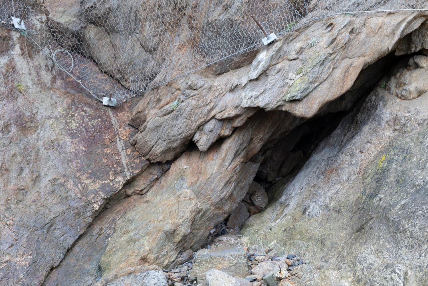 Metal mesh to secure the rocky coastline.