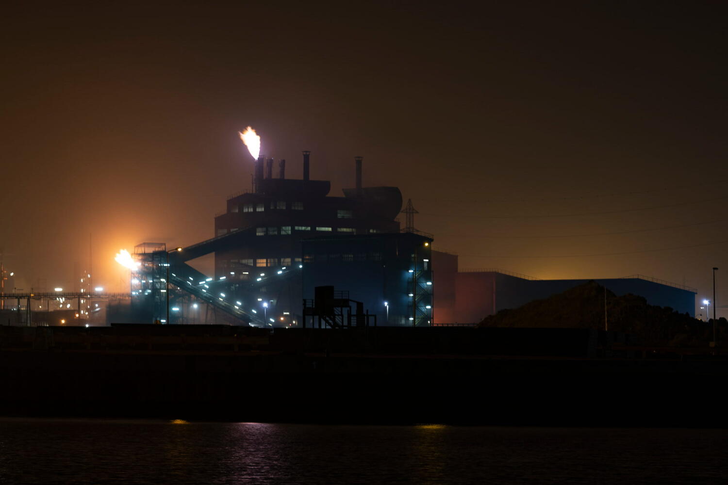 Petrochemical plant from the “Night Beasts” series. At night, these industrial plants transform into fantastic creatures that form a bestiary.