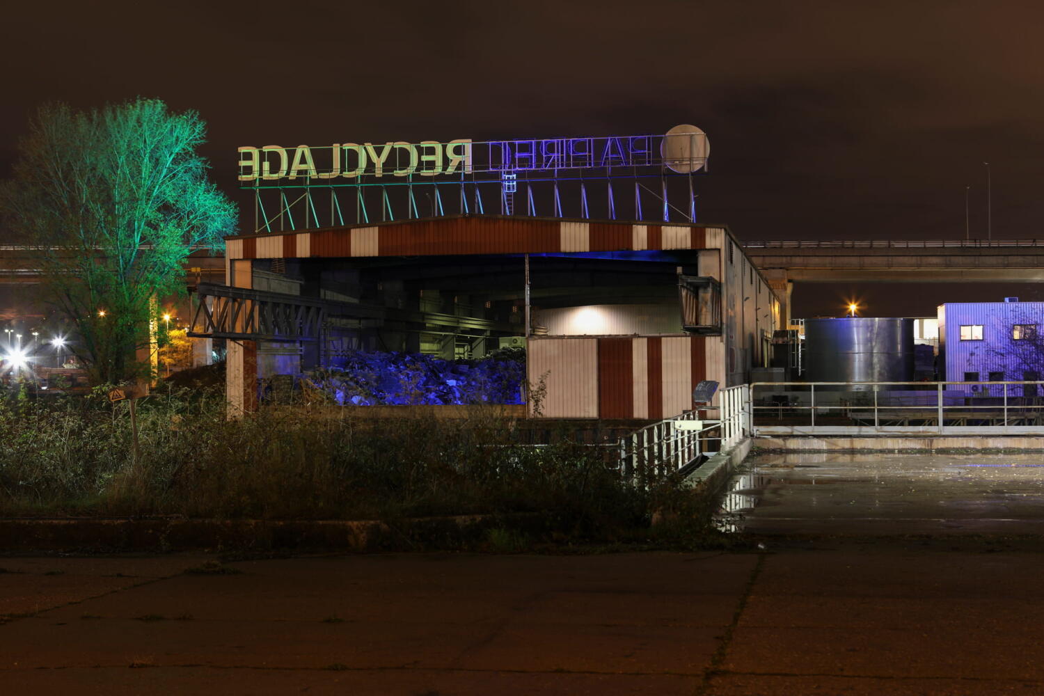 Recycling center from the “Night Beasts” series. During the night, these industrial facilities transform into fantastic creatures that form a bestiary.