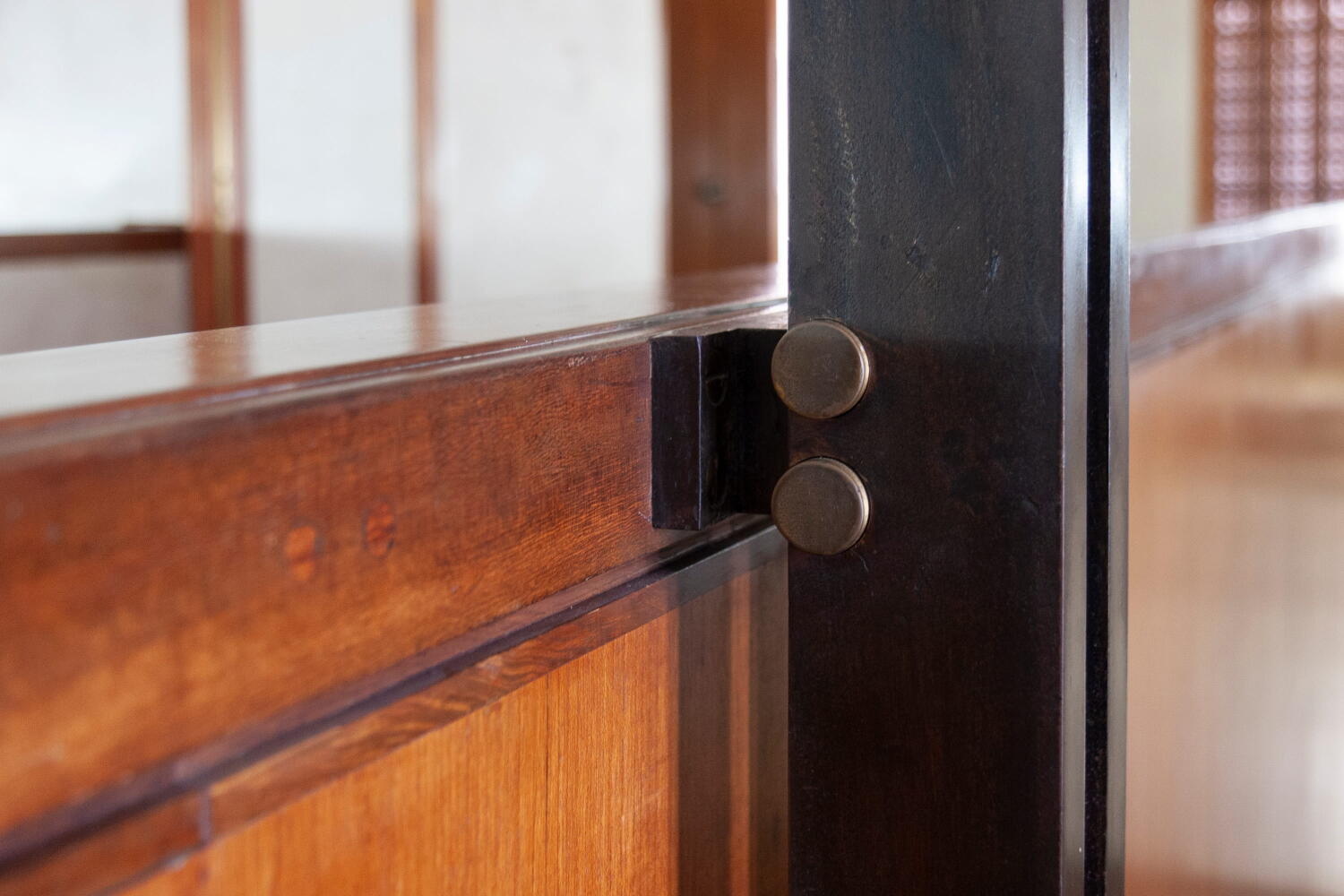 Detail in wood and brass of the railing in the Olivetti Showroom designed by architect Carlo Scarpa in Venice.