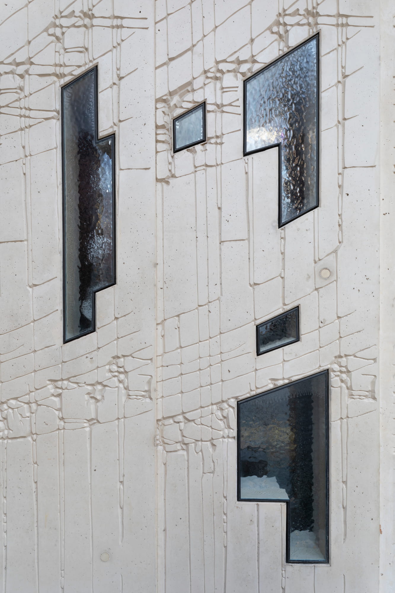 The façade is decorated with greatly enlarged fragments of architectural sketches in relief form. Tchoban Foundation Museum for Architectural Drawing by Tchoban Voss Architects in Berlin.