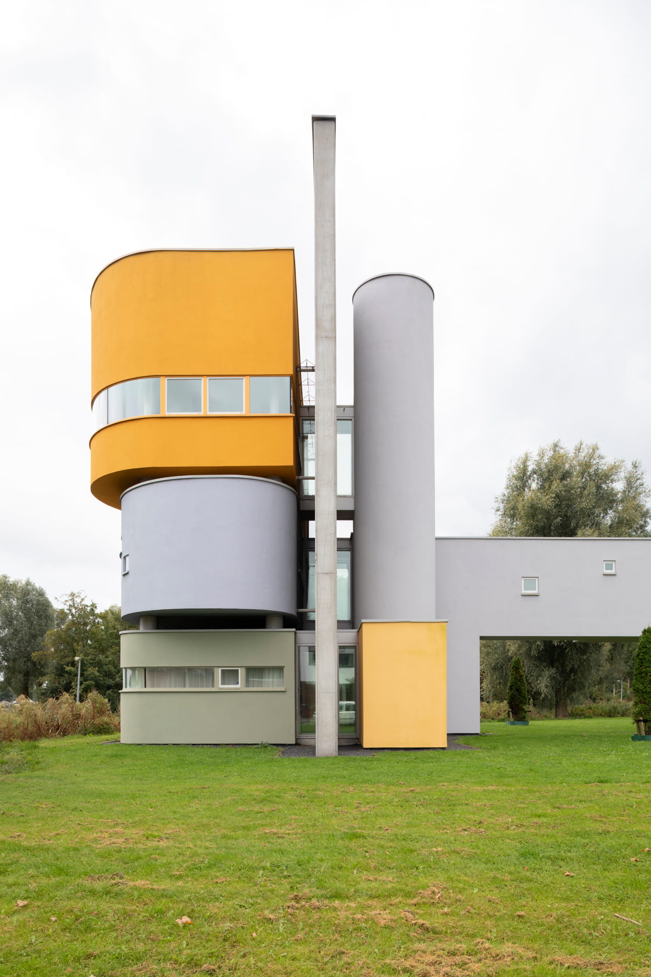  Lateral view of the playful volume made of colored reinforced concrete at Wall House #2 by John Hejduk Architect in Groningen, Holland. 