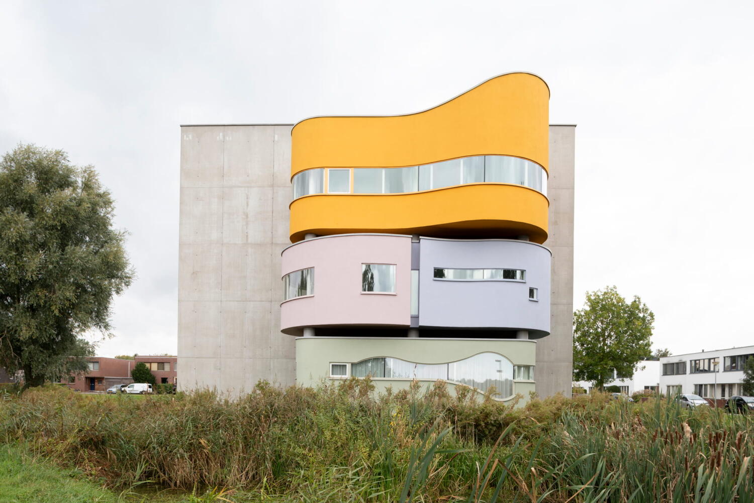 Colored reinforced concrete facade of Wall House #2 by John Hejduk Architect in Groningen, Holland. 