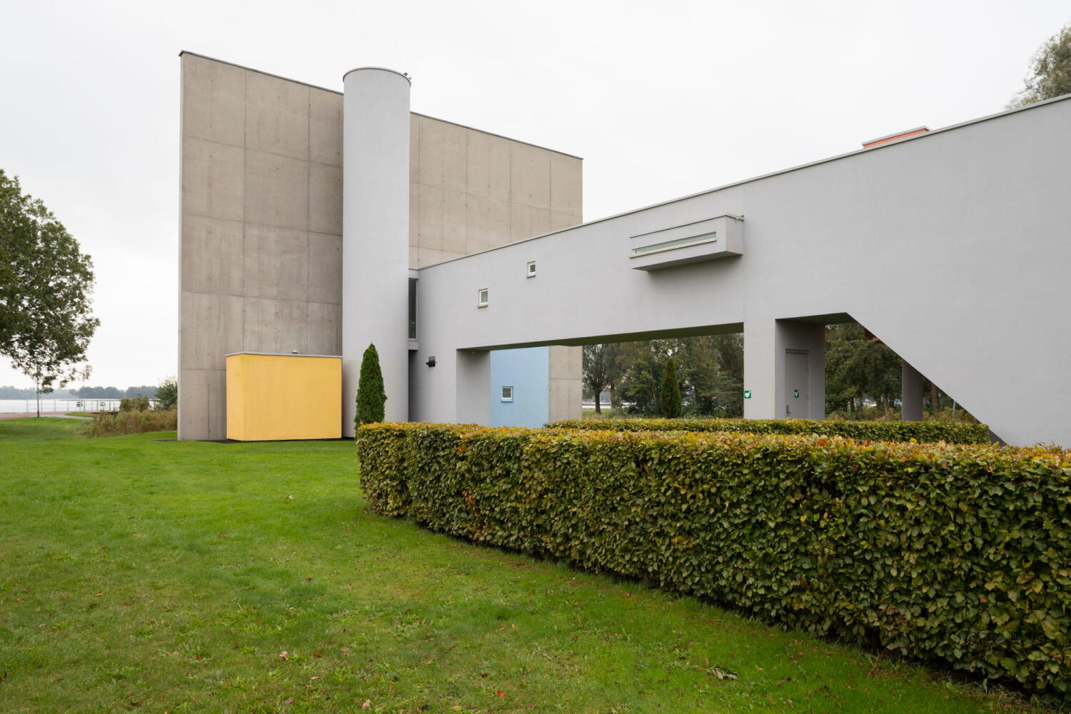 Side view of the playful volume made of colored reinforced concrete of Wall House #2 by John Hejduk Architect in Groningen, Holland. 