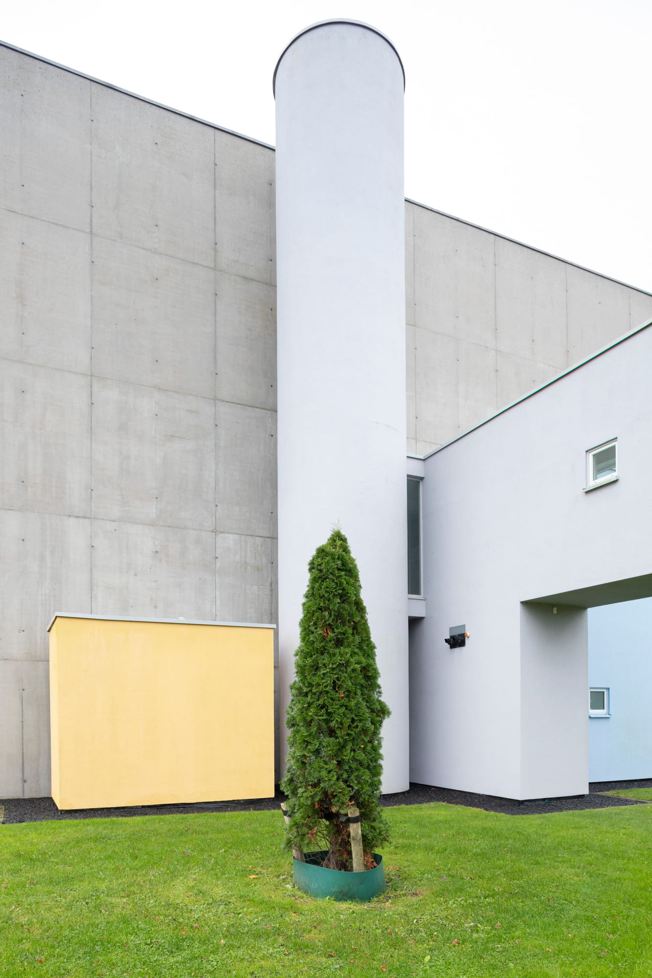 Side view of the playful volume made of colored reinforced concrete of Wall House #2 by John Hejduk Architect in Groningen, Holland. 