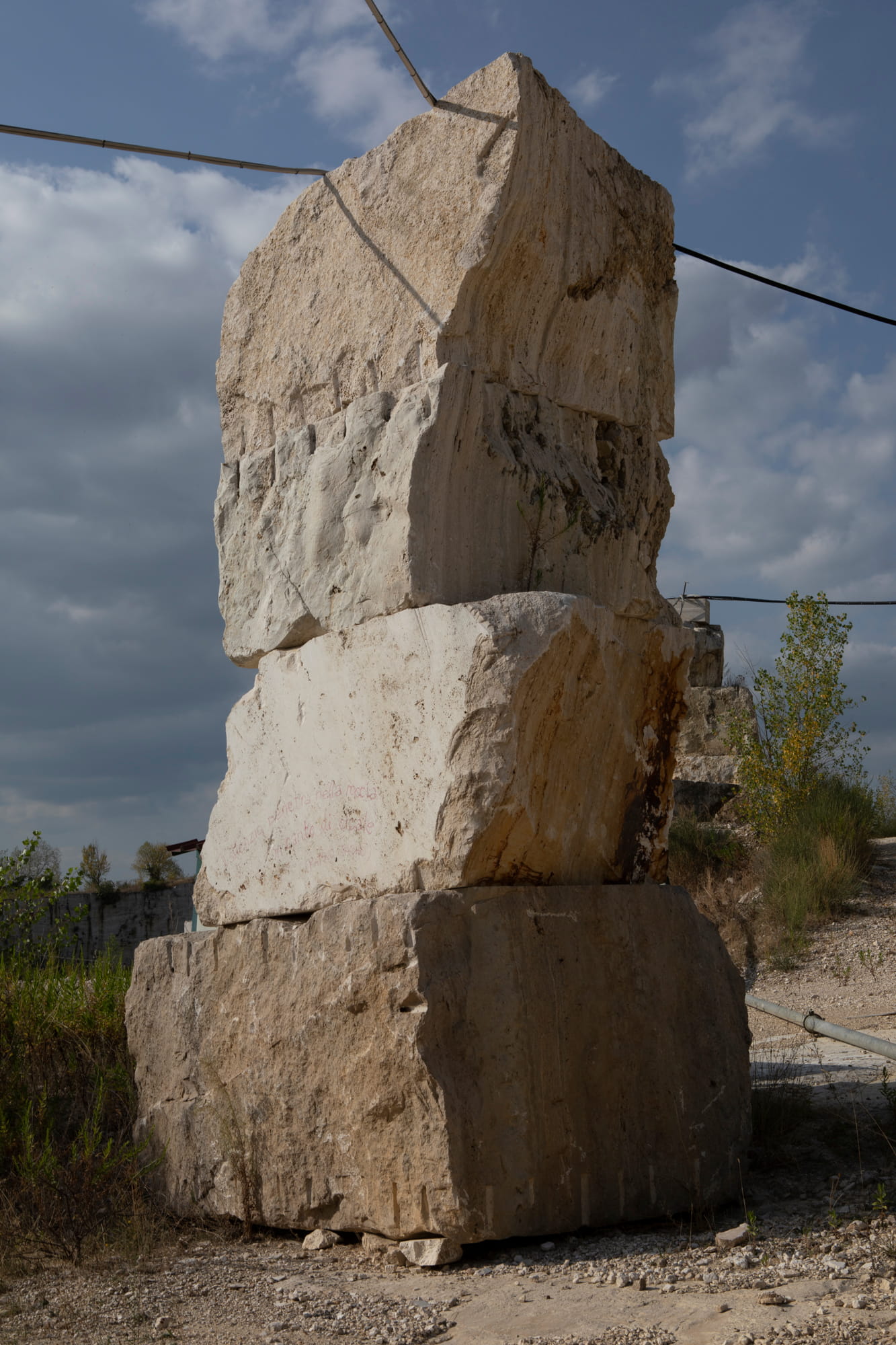 Tower of travertine pieces in a quarry in Tuscany, Italy.